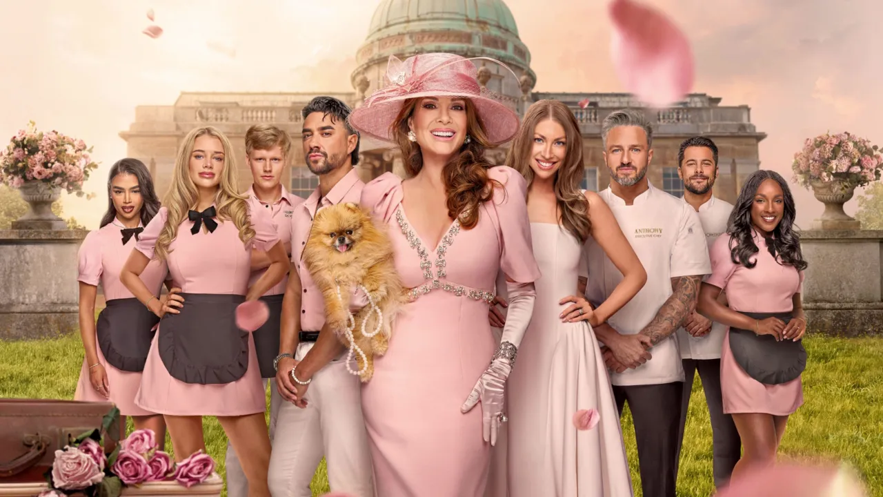 The cast of Vanderpump Villa stand in front of the Season 3 house. Lisa Vanderpump poses at the front with her pomeranian, Donut