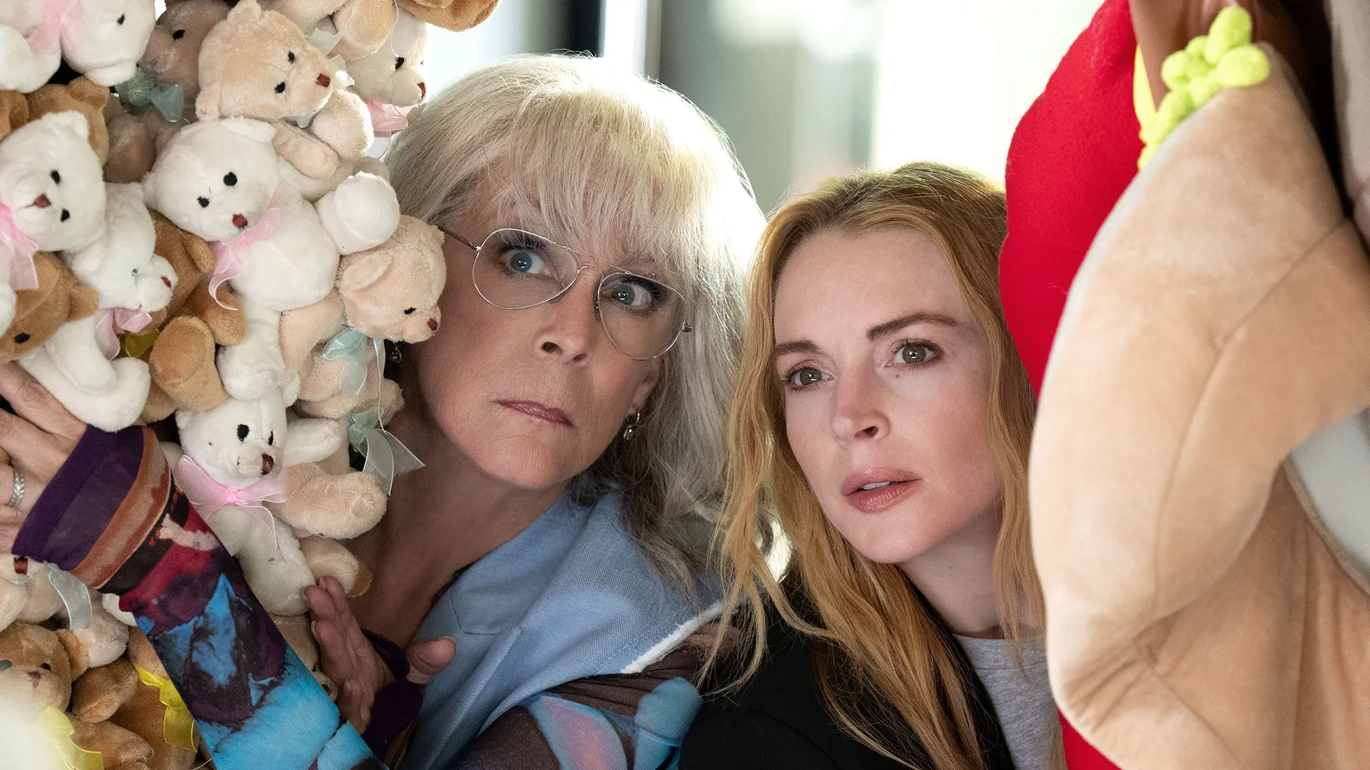 This image features actors Jamie Lee Curtis and Lindsay Lohan in a scene from the film, "Freakier Friday". 