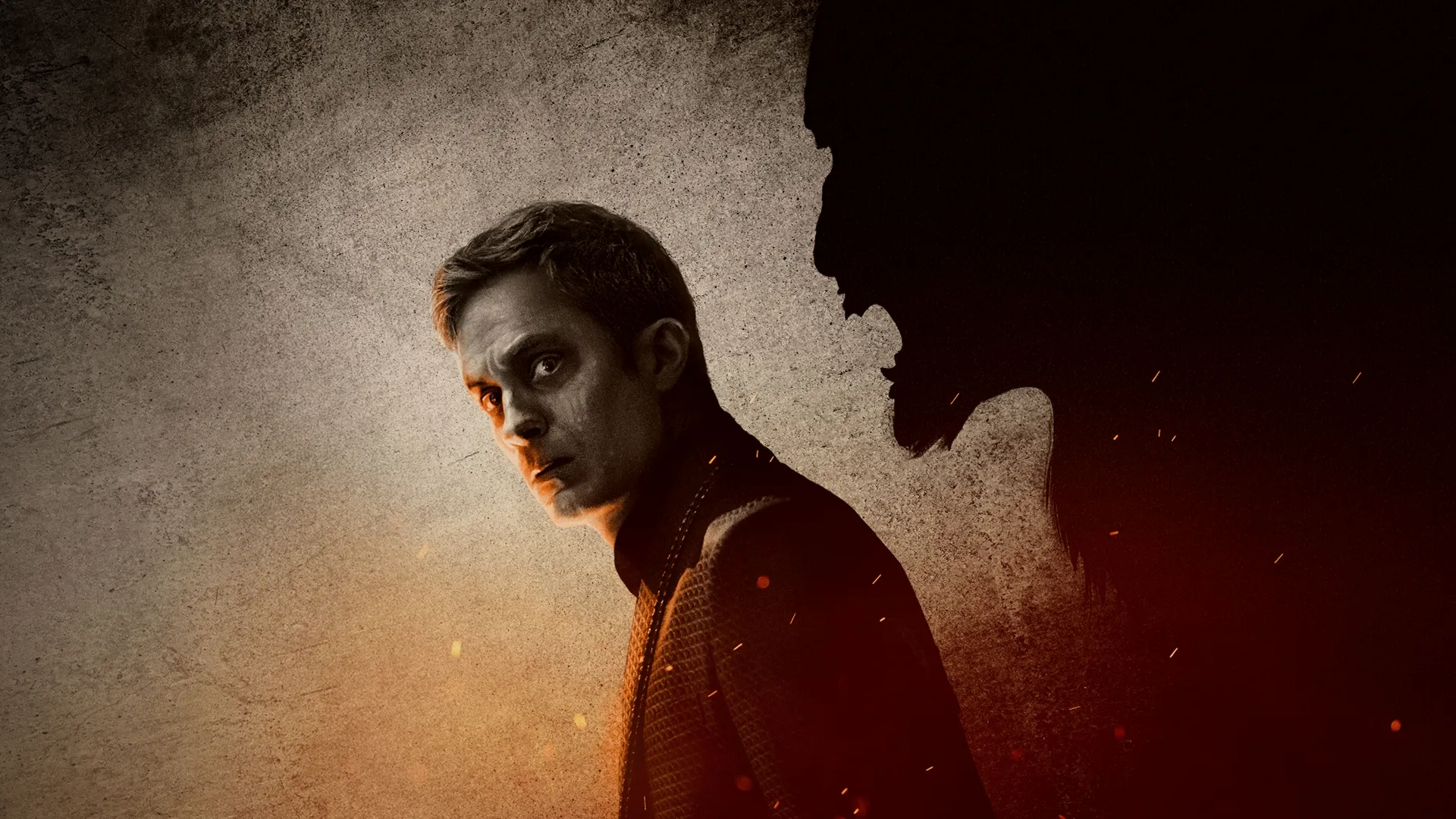 A man with the shadow of a werewolf behind him