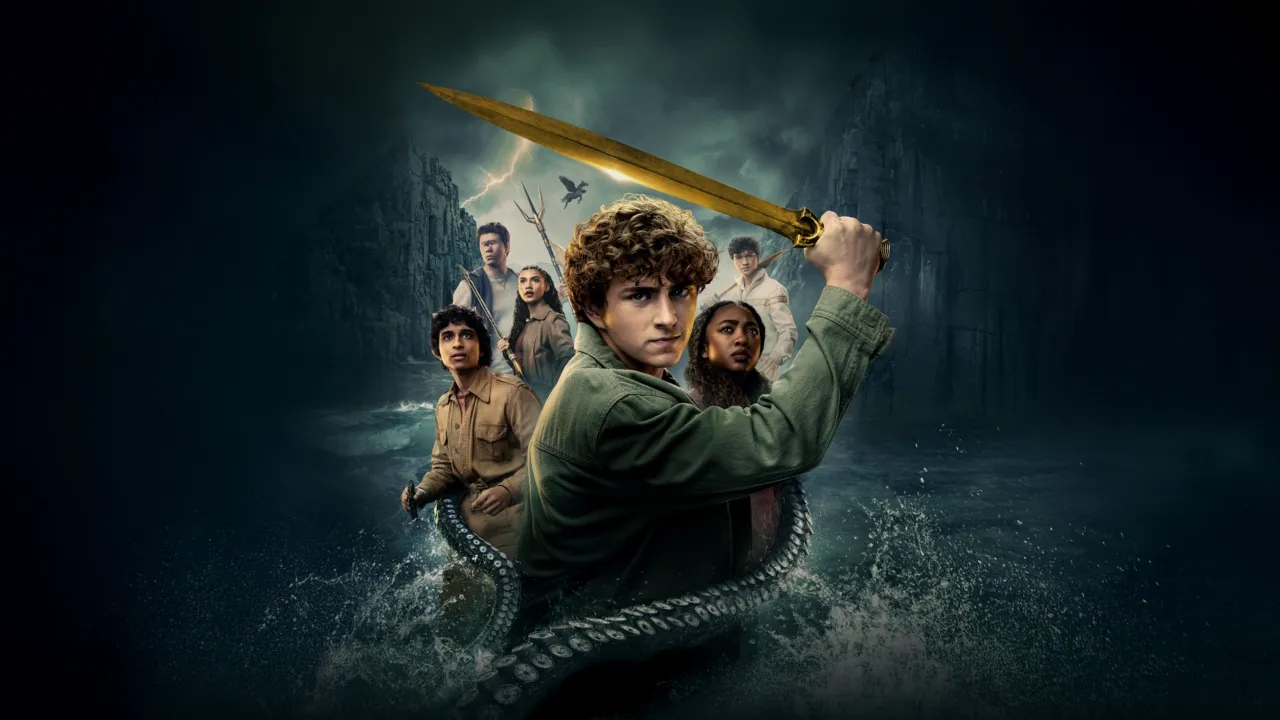 Percy Jackson (Walter Scobell) stands in the sea swinging a sword, with tentacles wrapping around him. Other characters from Percy Jackson and the Olympians appear in the background.