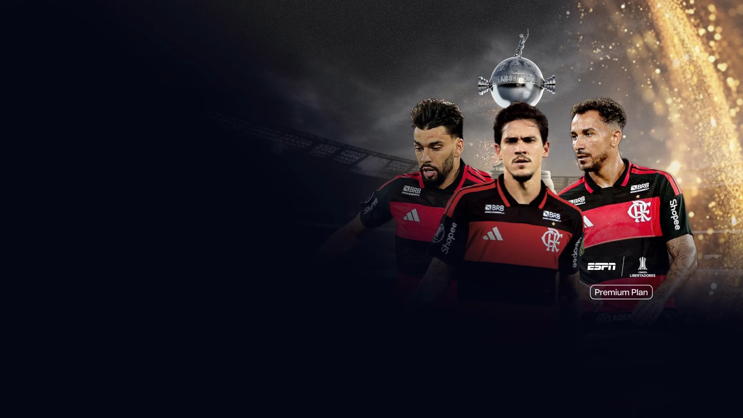 Promotional banner featuring three soccer players in red-and-black jerseys standing in a stadium under bright lights. A silver trophy appears above the players, with ESPN and Libertadores branding displayed alongside a “Premium Plan” label.