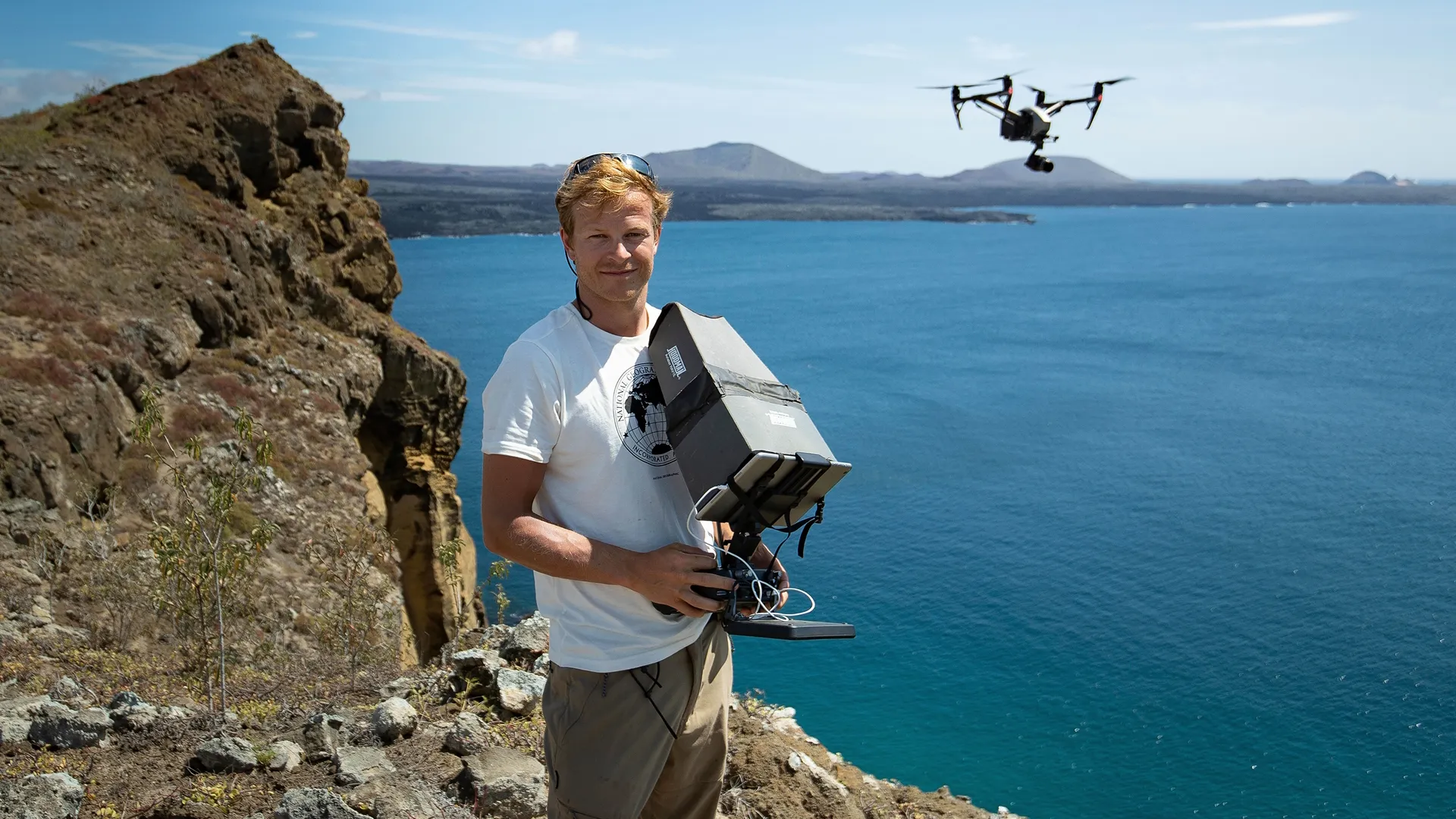 This image captures filmmaker Bertie Gregory during a filming expedition in the Galápagos Islands.