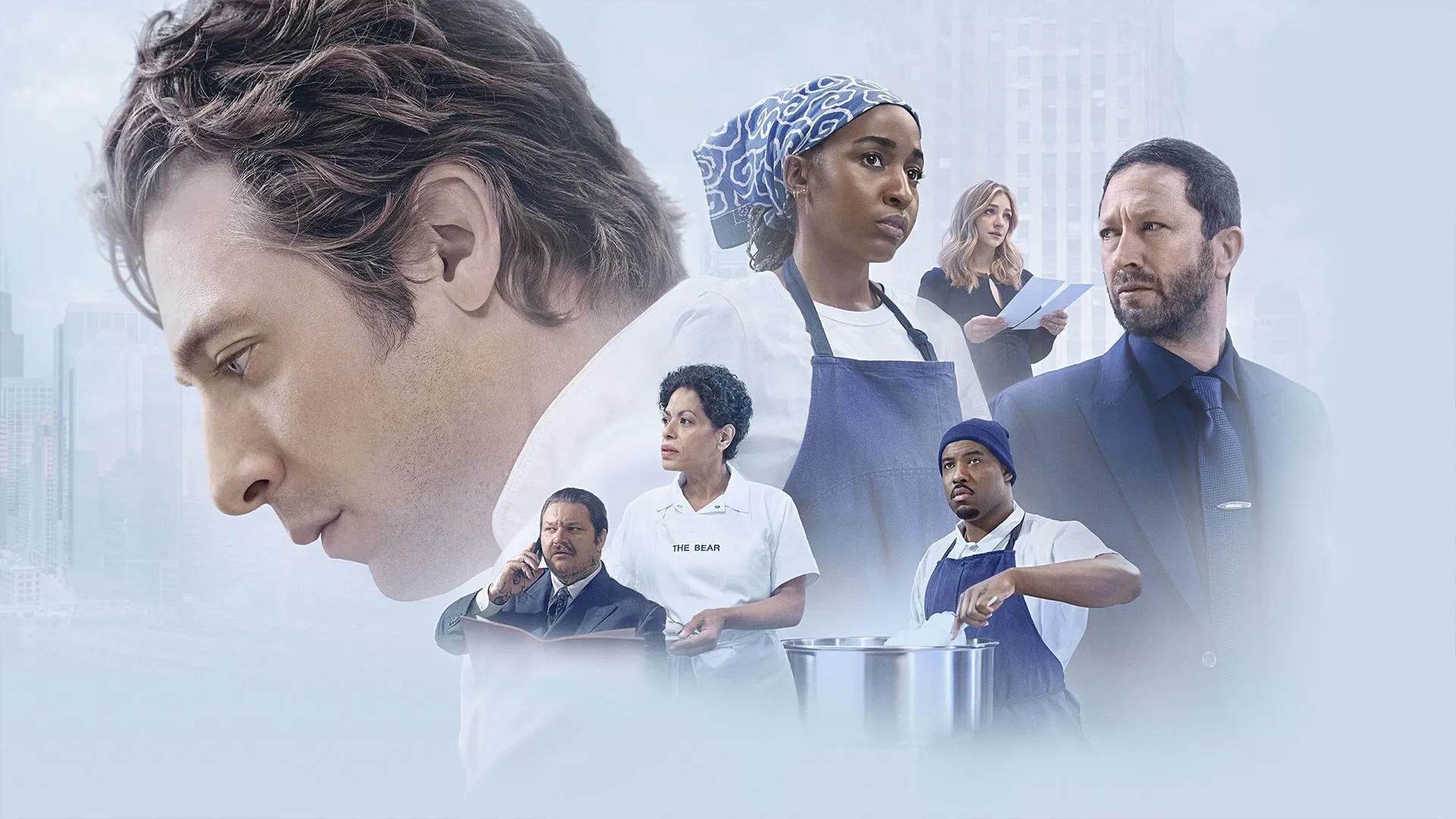 Key art for The Bear featuring multiple characters from the restaurant team arranged around a large portrait of the head chef against a city backdrop.