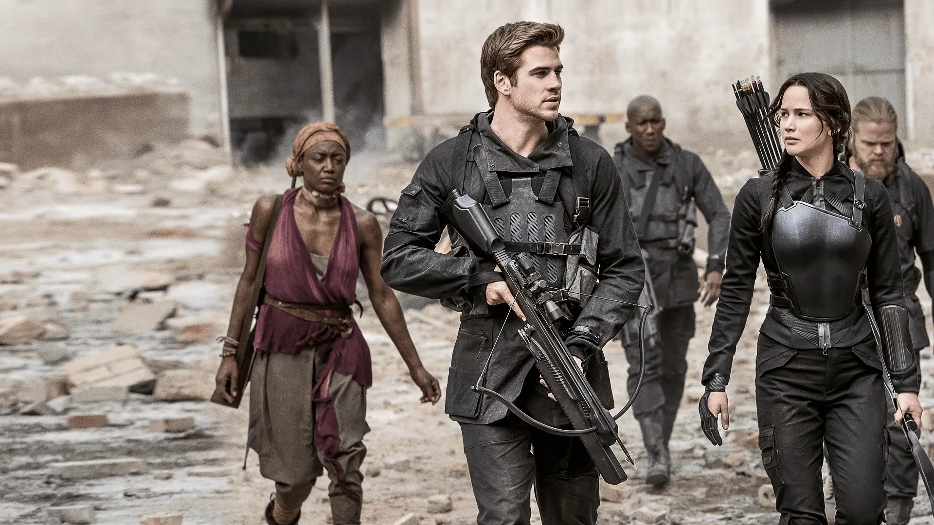 Liam Hemsworth as Gale Hawthorne and Jennifer Lawrence as Katniss Everdeen in The Hunger Games: Mockingjay – Part 1