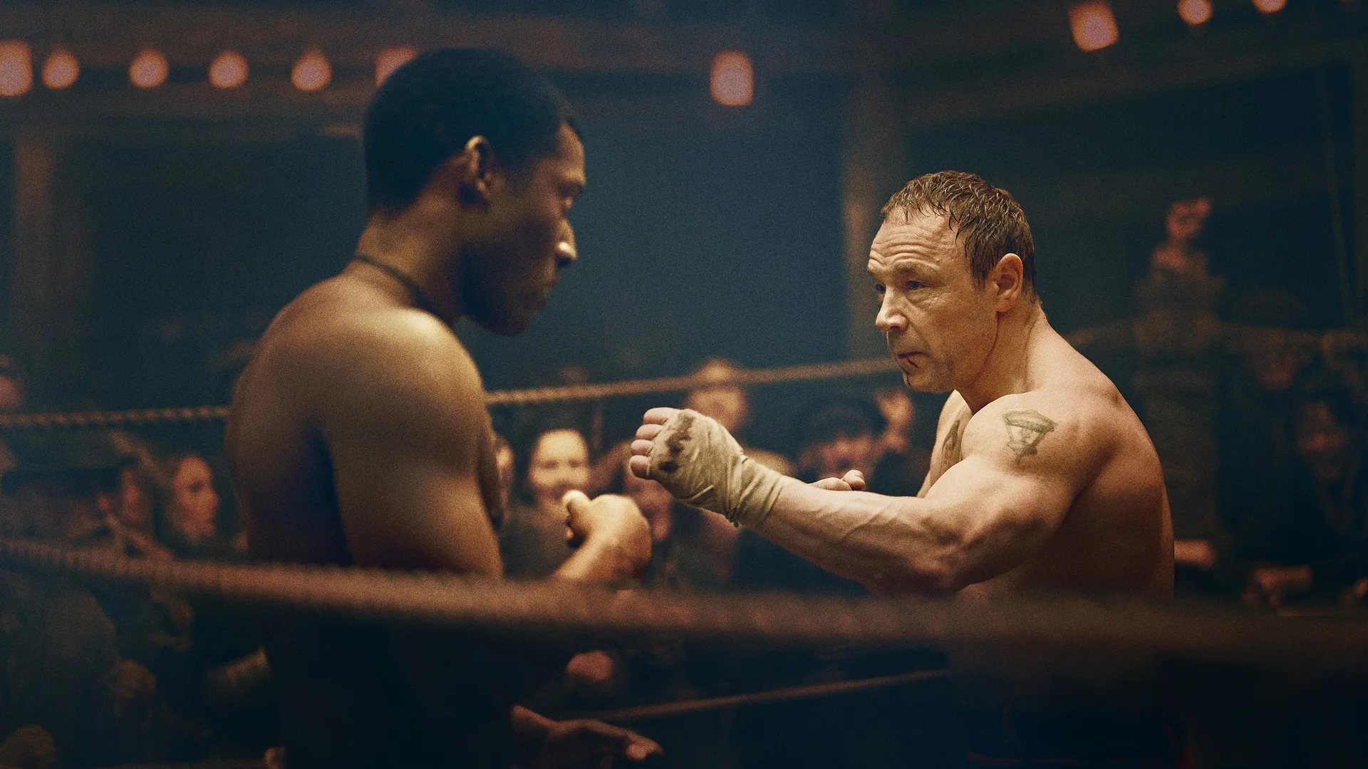 Hezekiah Moscow (Malachi Kirby) and Sugar Goodson (Stephen Graham) face off in a bare-knuckle ring