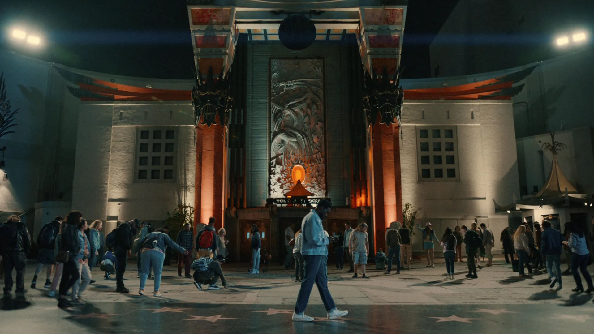 Simon Williams (Yahya Abdul-Mateen II) walks in front of Grauman's Chinese Theater