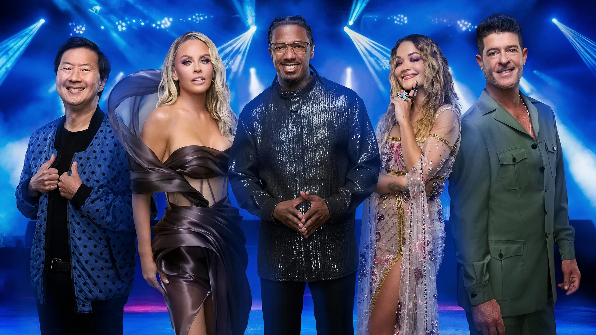 The Masked Singer host host Nick Cannon (center) with panelists (L-R:) Ken Jeong, Jenny McCarthy Wahlberg, Rita Ora, and Robin Thicke. 
