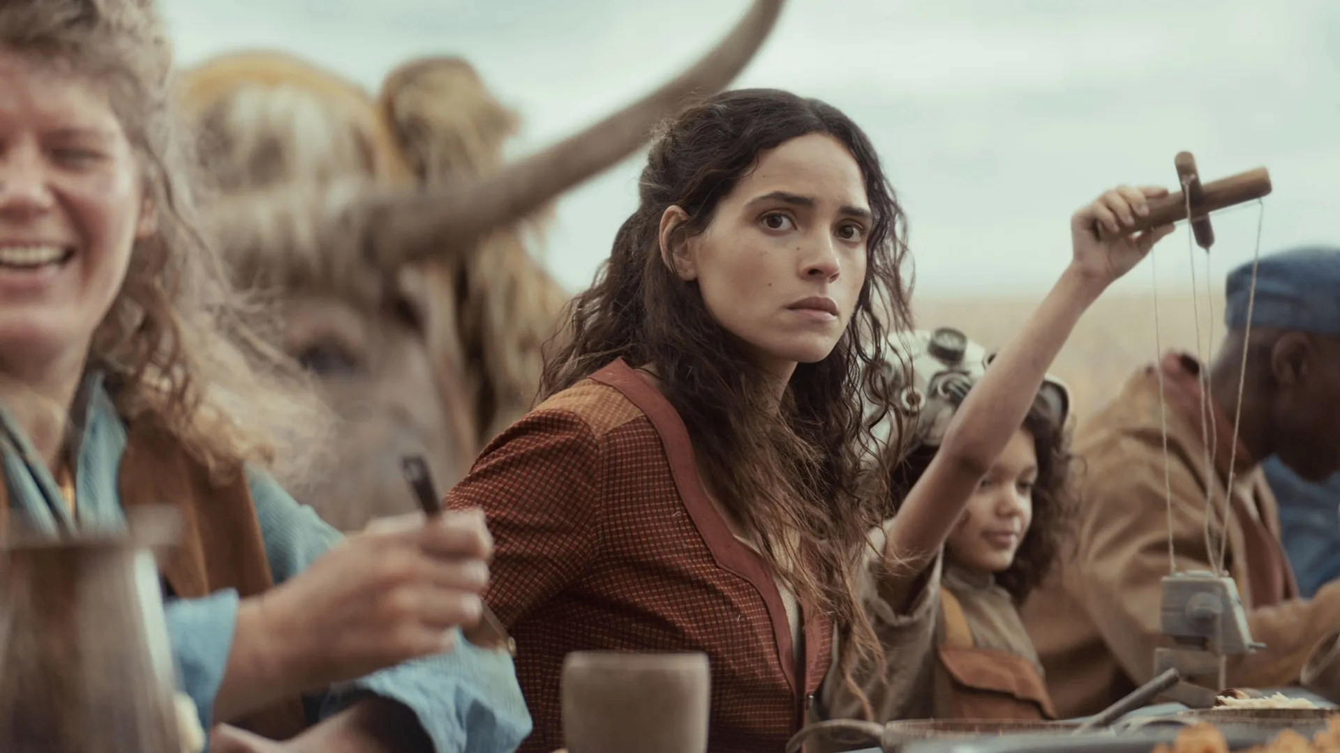 Bix Caleen looks out worriedly from a crowd.