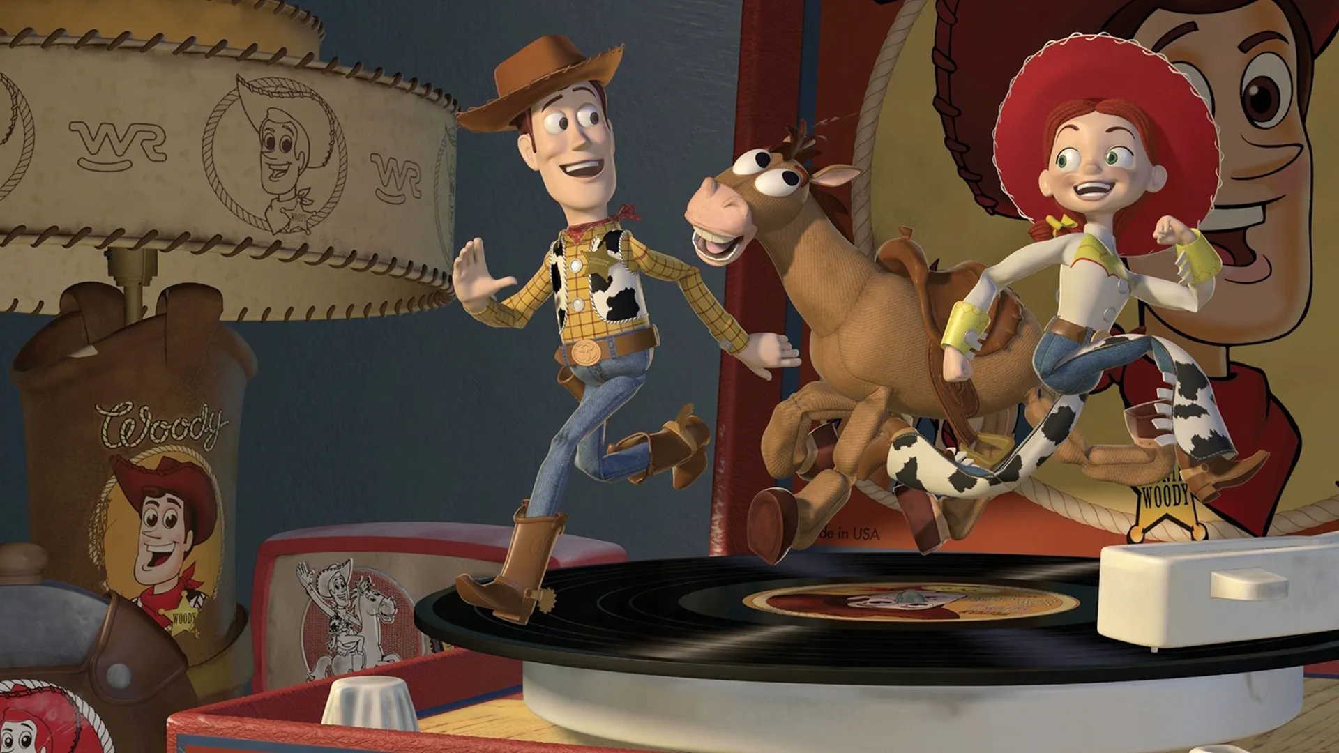 The toy cowboy Woody, his horse Bullseye, and the cowgirl Jessie run joyfully in circles on top of a spinning black vinyl record player, surrounded by vintage Woody's Roundup merchandise in a scene from Toy Story 2.
