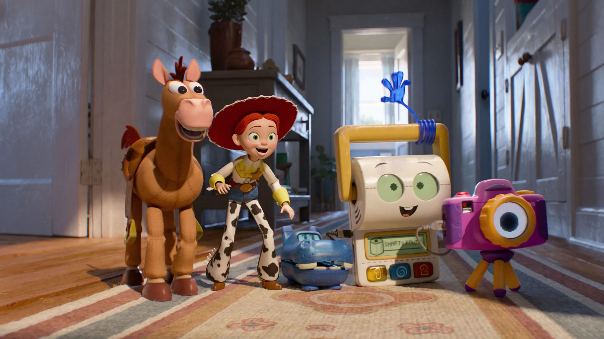 Jessie and Bullseye stand in a hallway with other toys in a scene from Disney and Pixar's Toy Story 5.