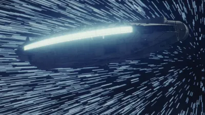宇宙を高速で飛行するスター・ウォーズの宇宙船
