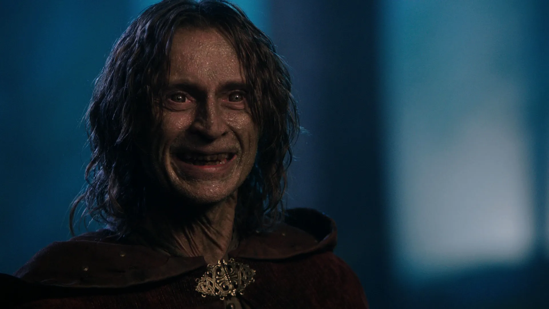 Robert Carlyle smiling as Rumpelstiltskin from the television series Once Upon a Time. 