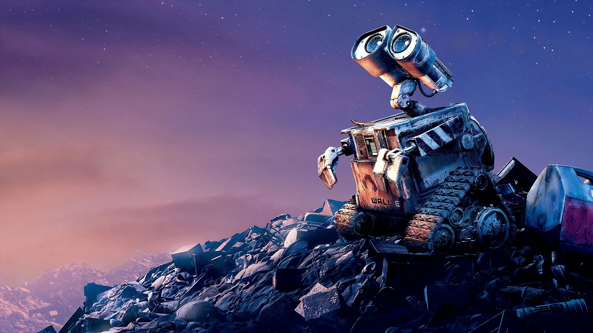 Wall-E stares at the sky on top of garbage