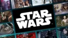 A collage of images from multiple Star Wars movies, with the Star Wars logo in the middle