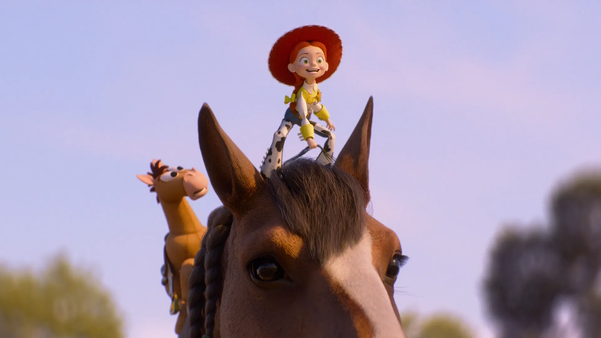 Jessie the cowgirl standing on top of the head of a real, large brown horse with a white stripe down its face, while Bullseye looks up from behind in a scene from Disney and Pixar's Toy Story 5.