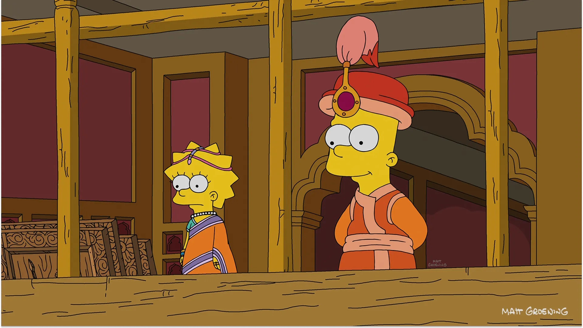 Bart e Lisa Simpson vestidos com trajes tradicionais indianos para uma história da escola dominical