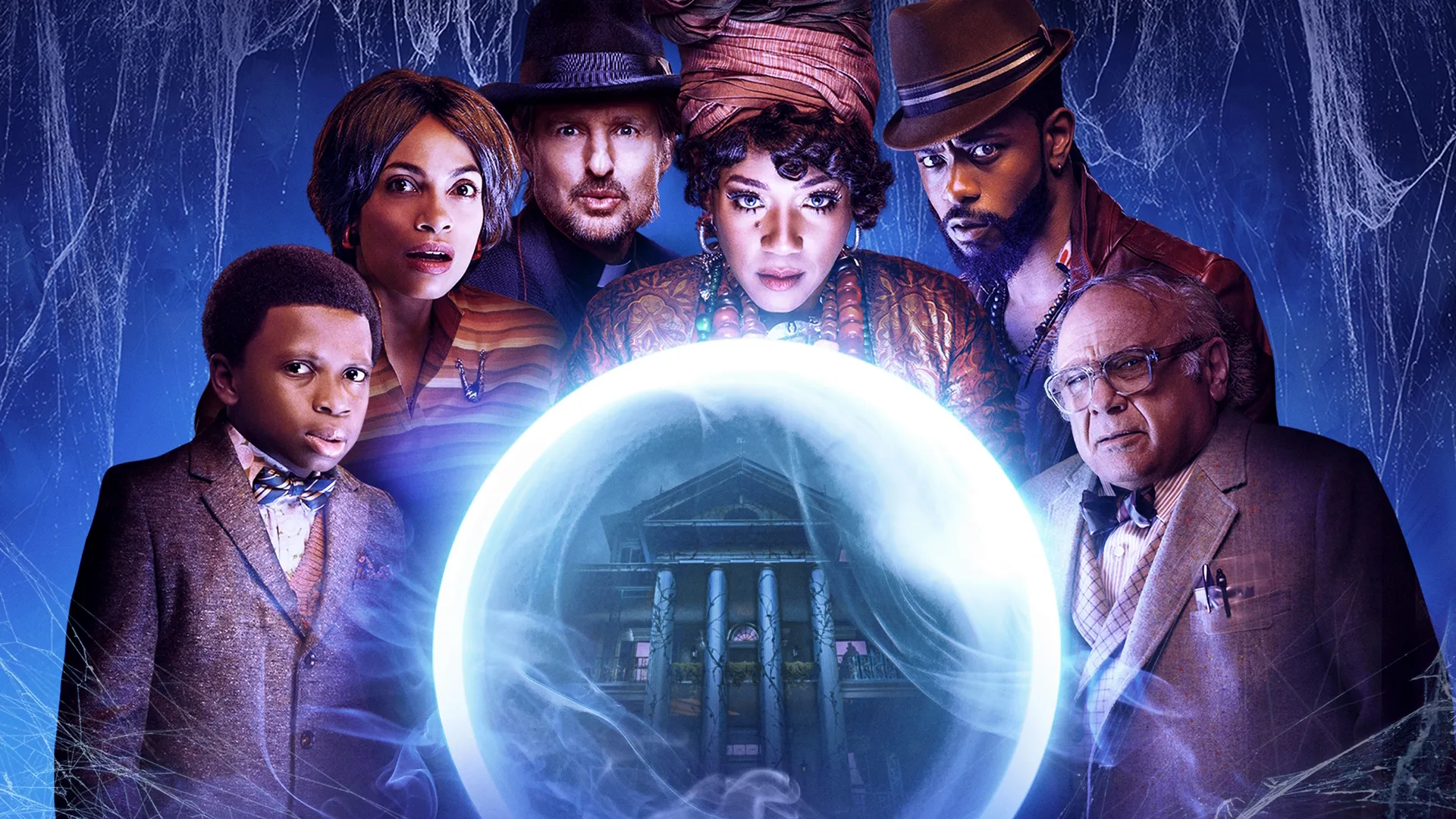 Promotional art for Haunted Mansion (2023) featuring the main cast peering into a crystal ball that shows the titular haunted mansion.