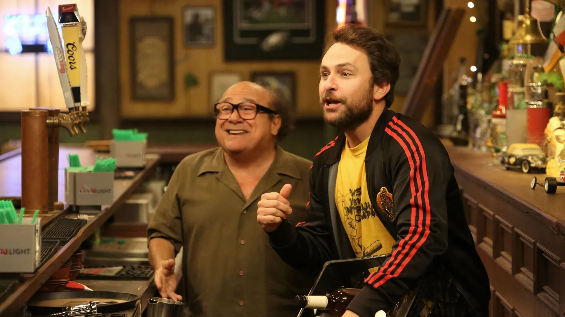 Frank (Danny DeVito) and Charlie (Charlie Day) in the bar.
