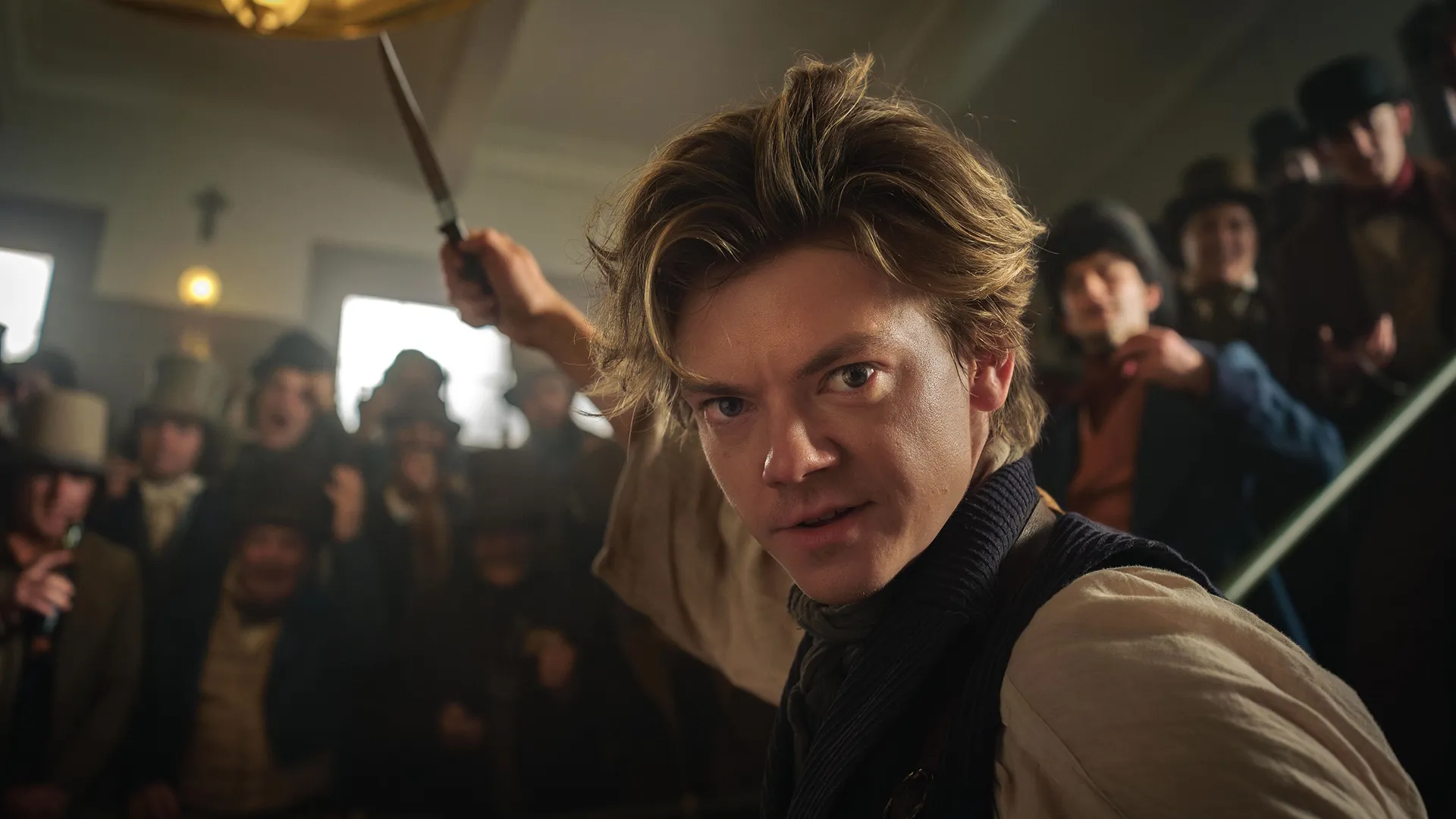 The image shows actor Thomas Brodie-Sangster in character as Jack Dawkins from the 2023 Hulu/Disney+ series The Artful Dodger. 