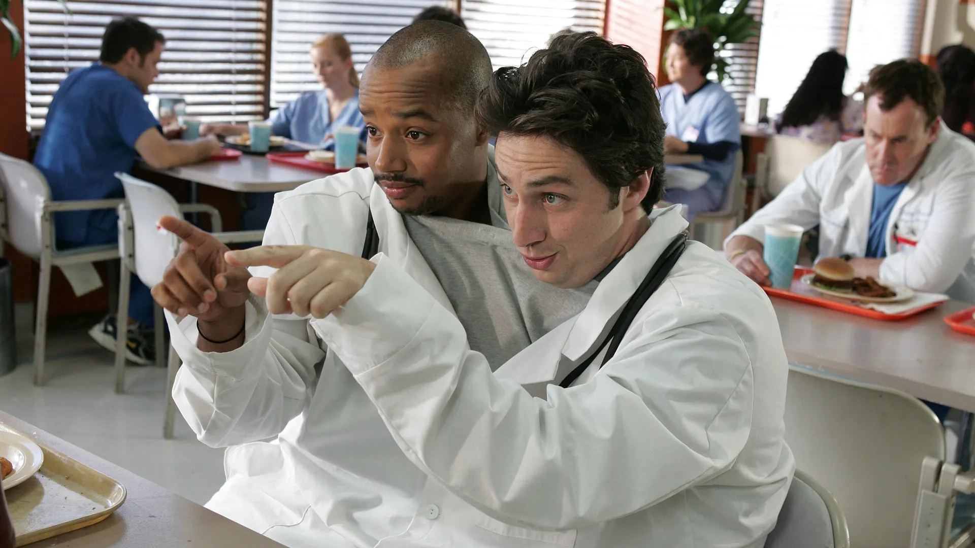 J.D. (Zach Braff) and Christopher Turk (Donald Faison) in Scrubs.