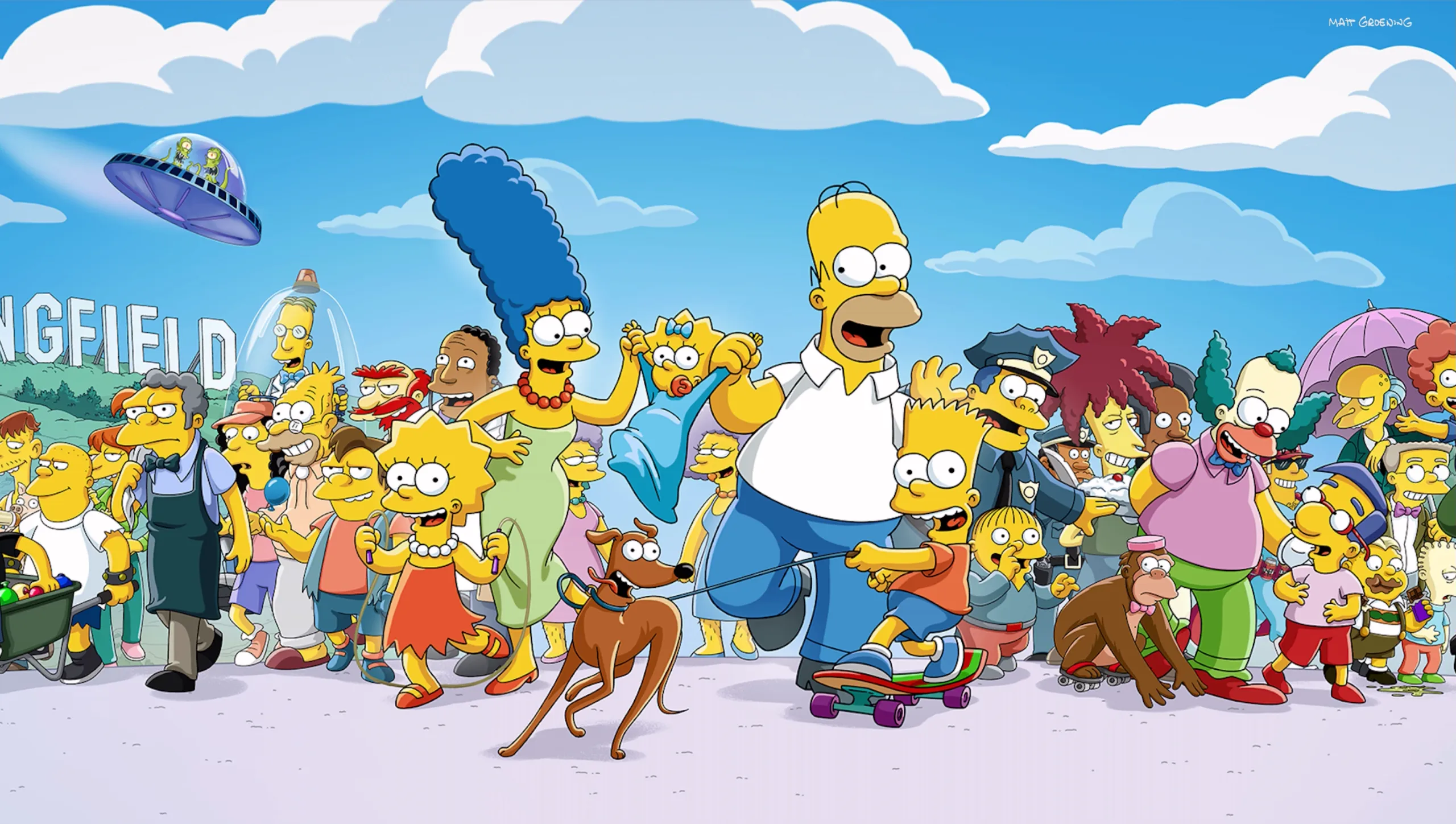 Imagem de um grande grupo de personagens da série de animação Os Simpsons caminhando juntos.