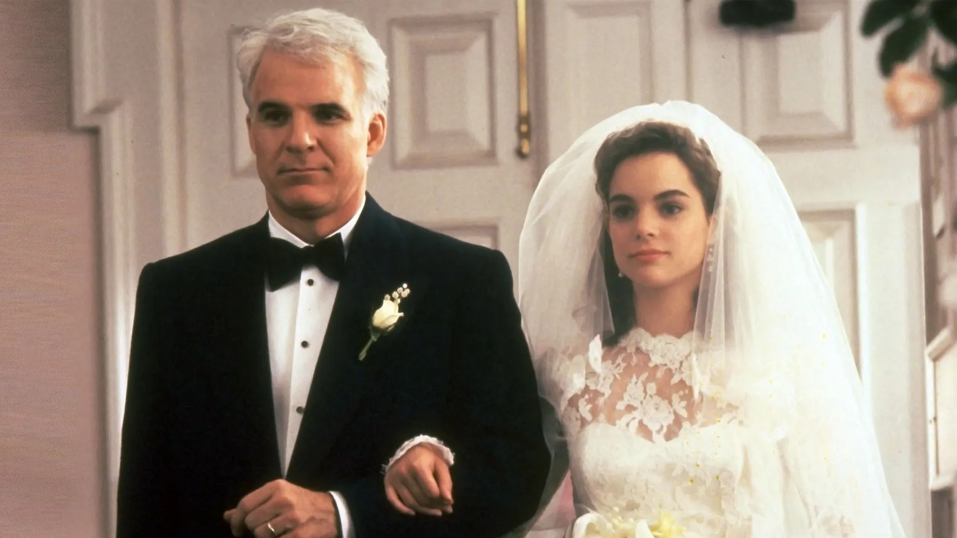 This image features Steve Martin and Kimberly Williams-Paisley from the 1991 romantic comedy film Father of the Bride.
