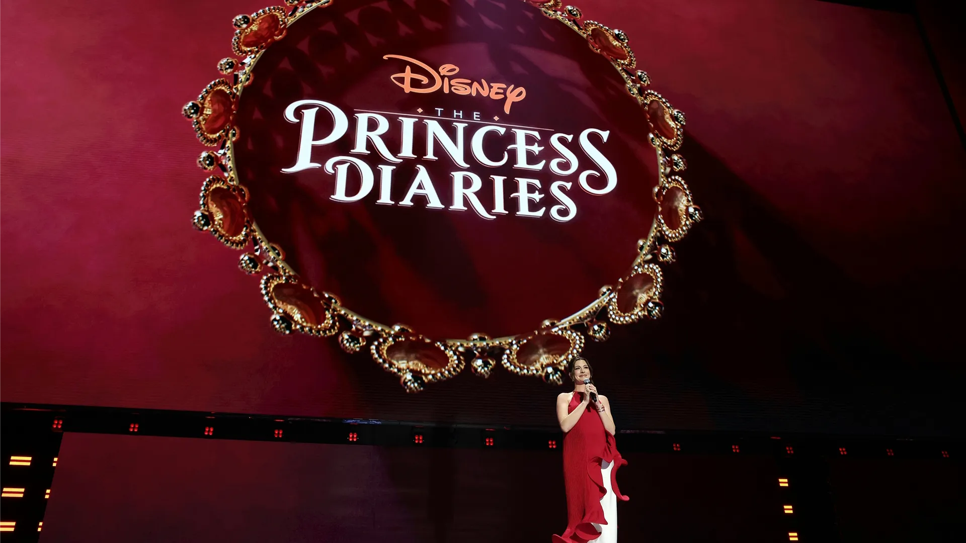 Anne hathaway on stage during the Princess Diaries anniversary celebration at D23: The Ultimate Disney Fan Event 2026