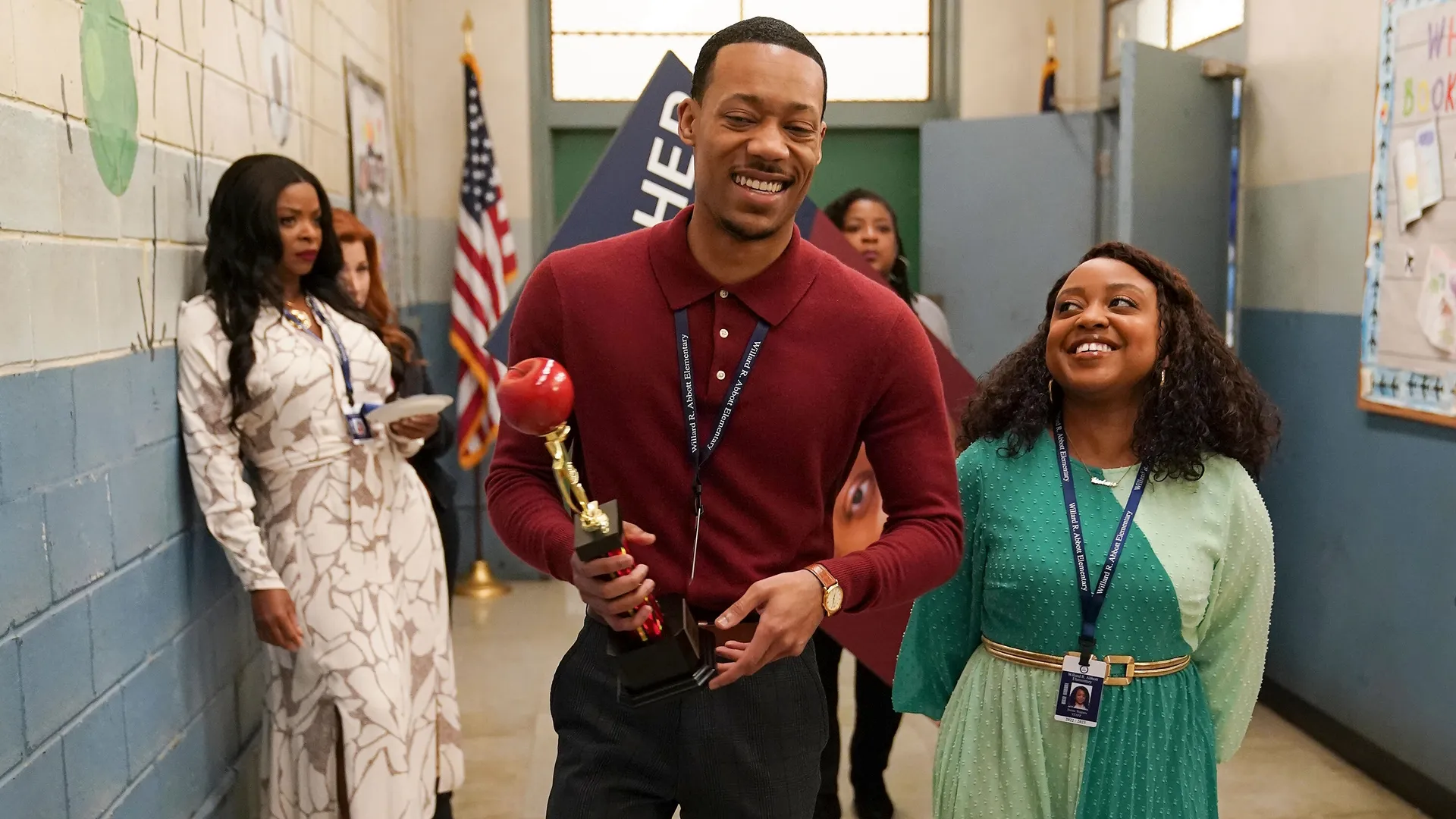 Cast of Abbott Elementary in the school halls.