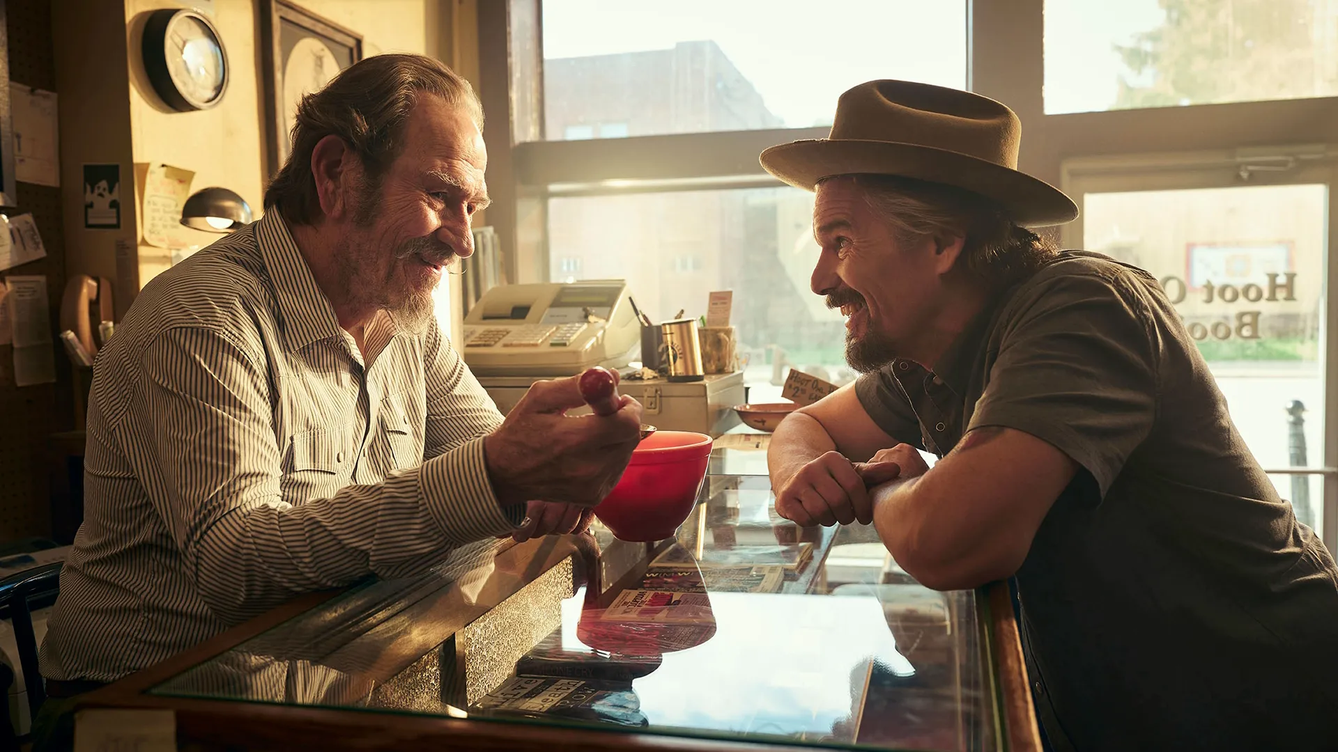 Tommy Lee Jones (left) playing Lee Raybon Sr. and Ethan Hawke (right) playing Lee Raybon in FX's The Lowdown