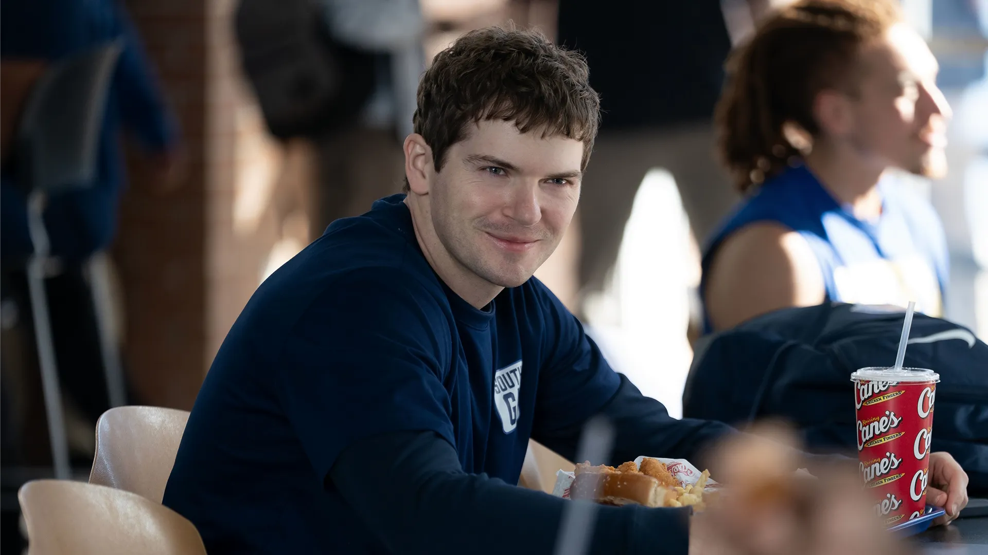 A South Georgia Catfish football player having a meal in Chad Powers