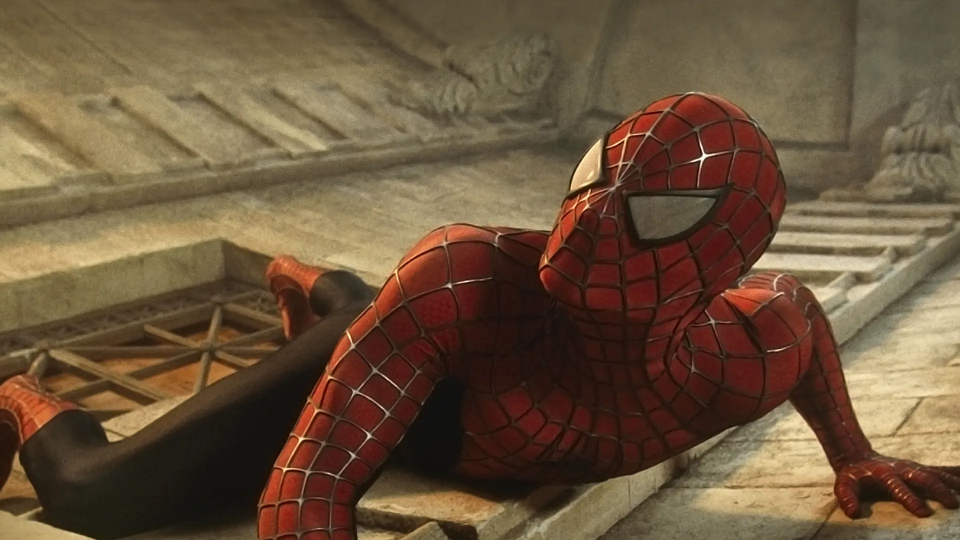 Spider-Man looks up from the ground.