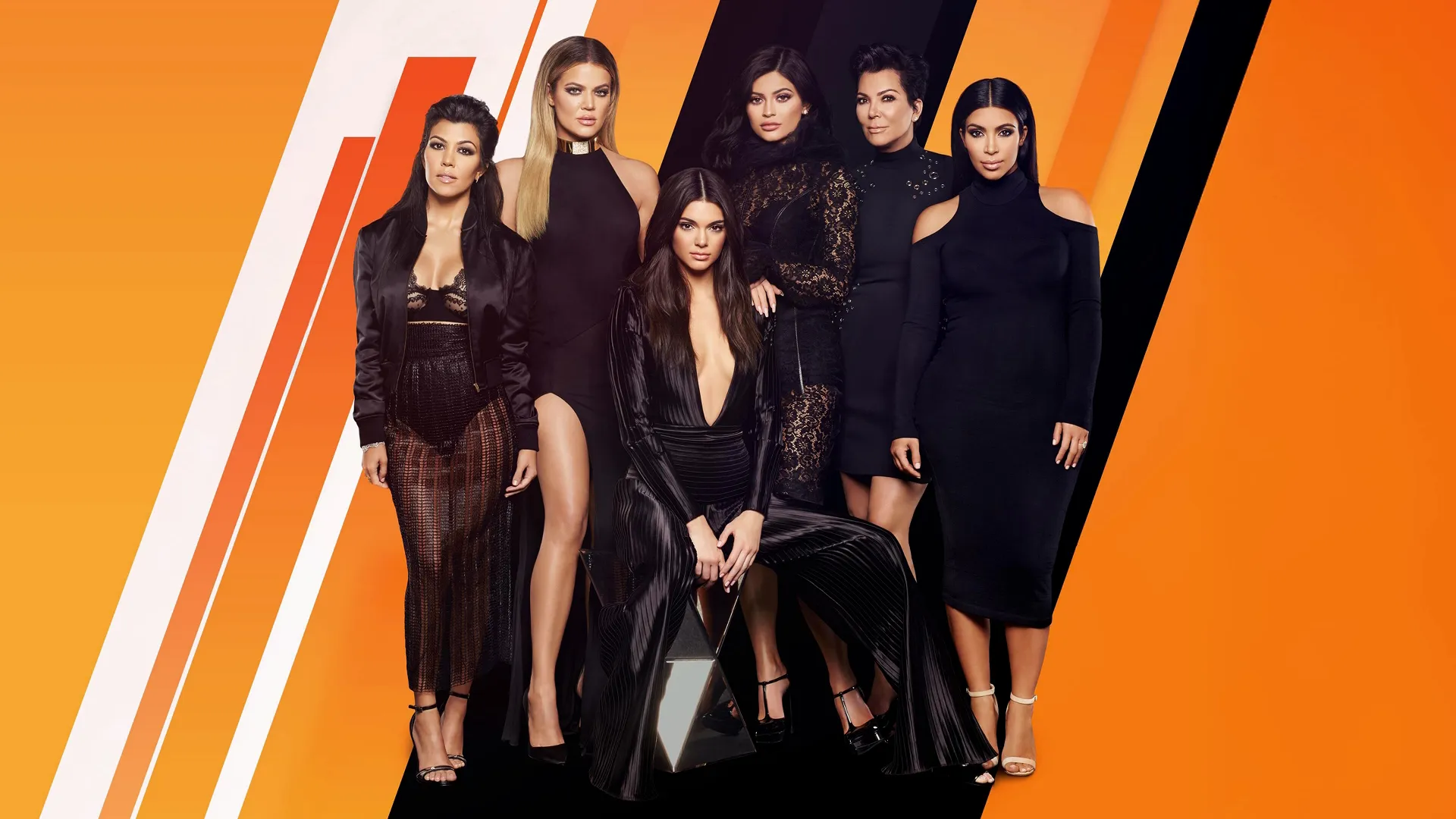 This image features Kourtney Kardashian, Khloé Kardashian, Kendall Jenner, Kylie Jenner, Kris Jenner, and Kim Kardashian in a promotional photo for their reality television show Keeping Up with the Kardashians. 