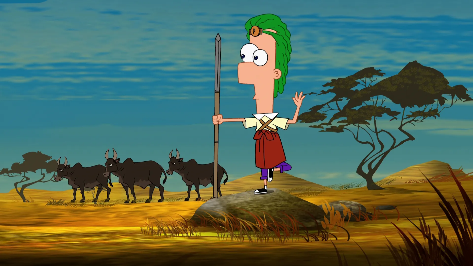Ferb (voiced by David Errigo Jr.), wearing traditional attire and long hair, stands on one leg holding a spear, with buffalo in the background