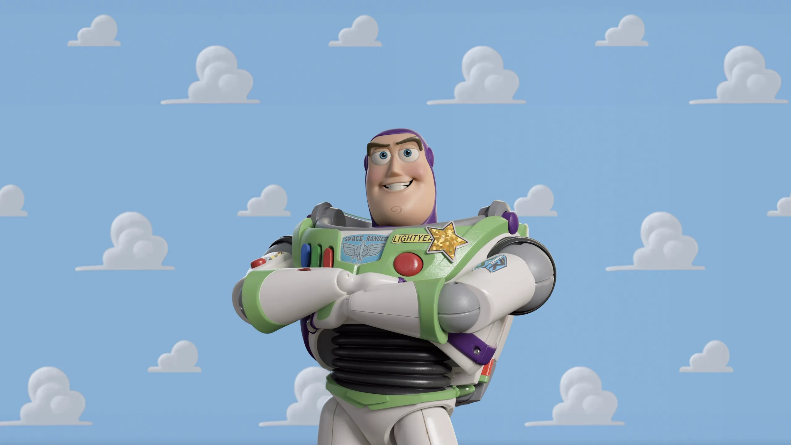 Buzz Lightyear standing with his arms crossed and a confident smile