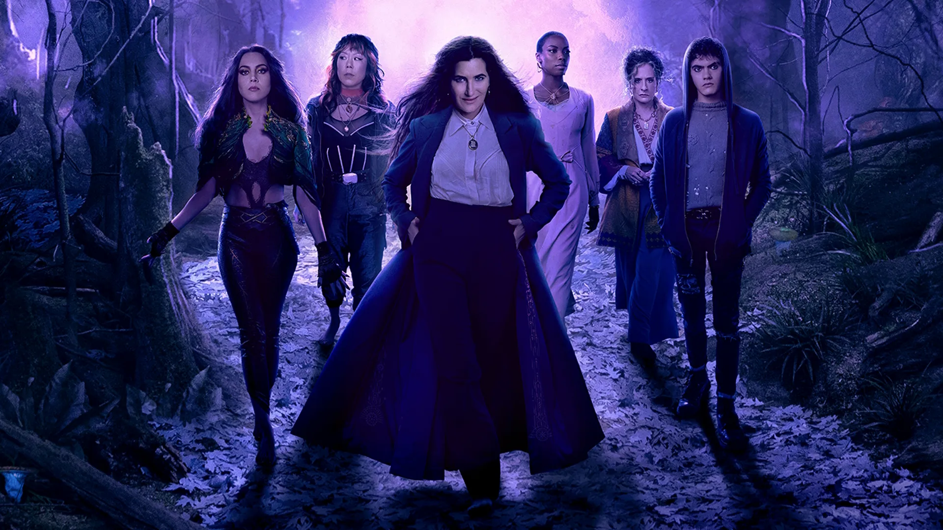 Agatha and her coven of fellow witches walk down the Witches' Road.