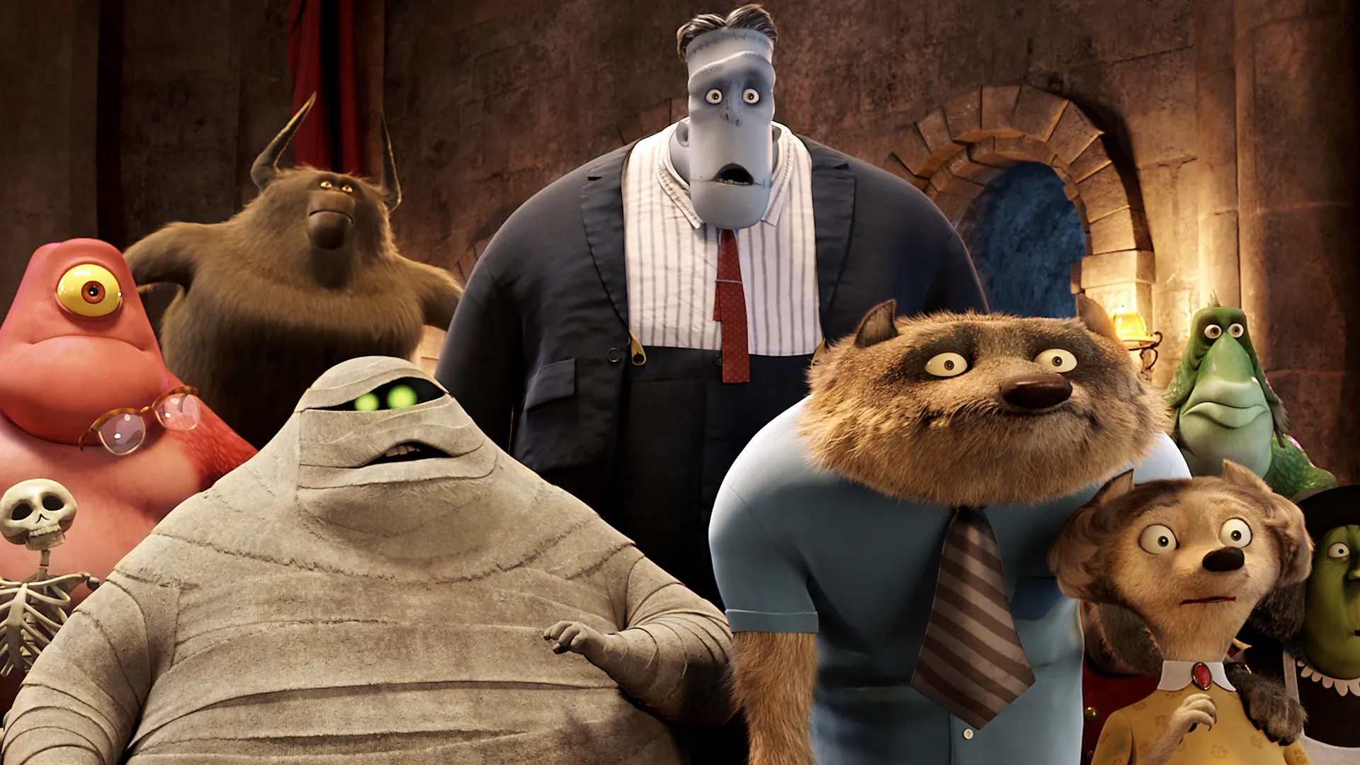 This image features monster characters from the animated film Hotel Transylvania (2012), including Frankenstein (voiced by Kevin James), Murray the Mummy (voiced by CeeLo Green), and Wayne and Wanda Werewolf (voiced by Steve Buscemi and Molly Shannon). 
