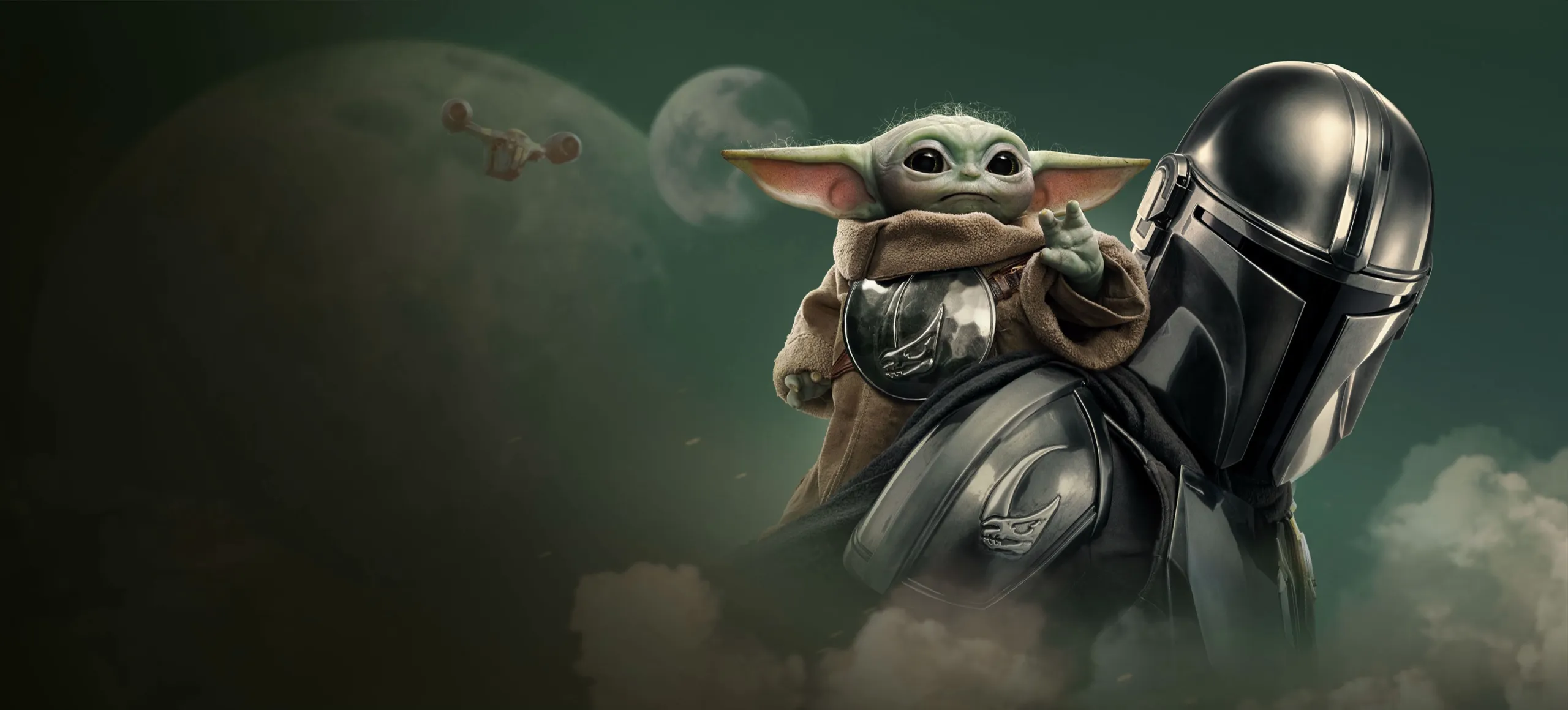 Grogu standing beside an armored Mandalorian against a sci-fi backdrop with planets and a spacecraft from the Star Wars universe.