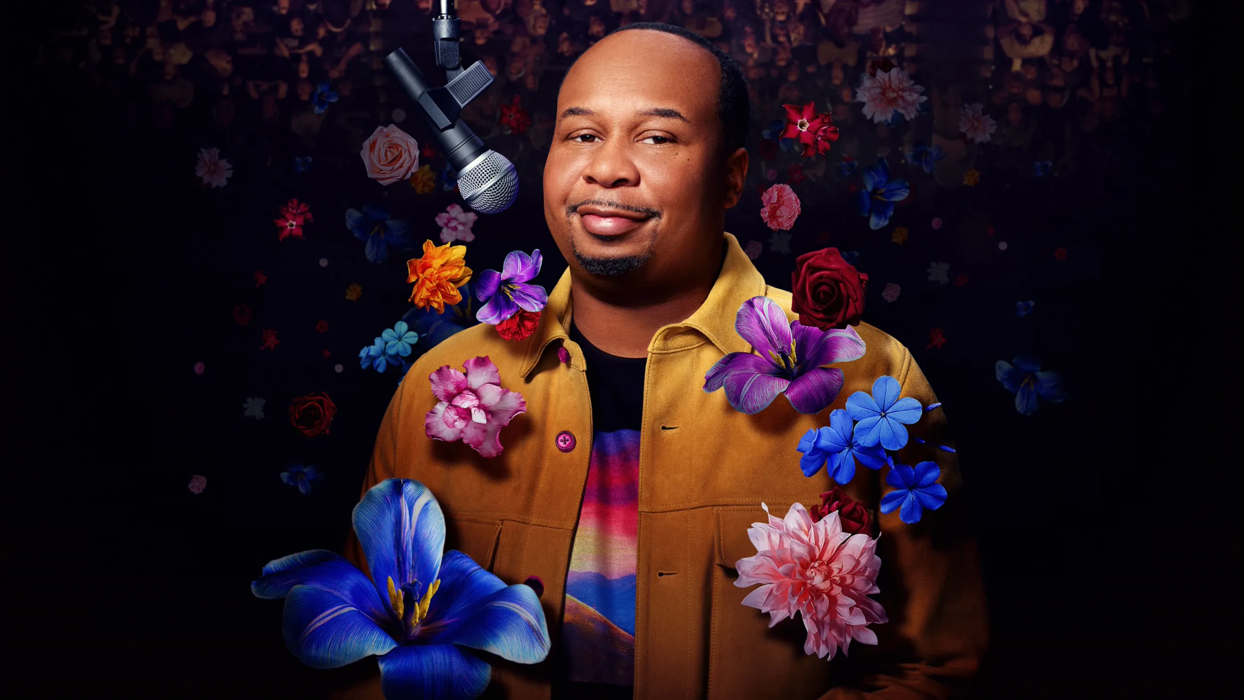The image features comedian Roy Wood Jr. in an empty theater. 