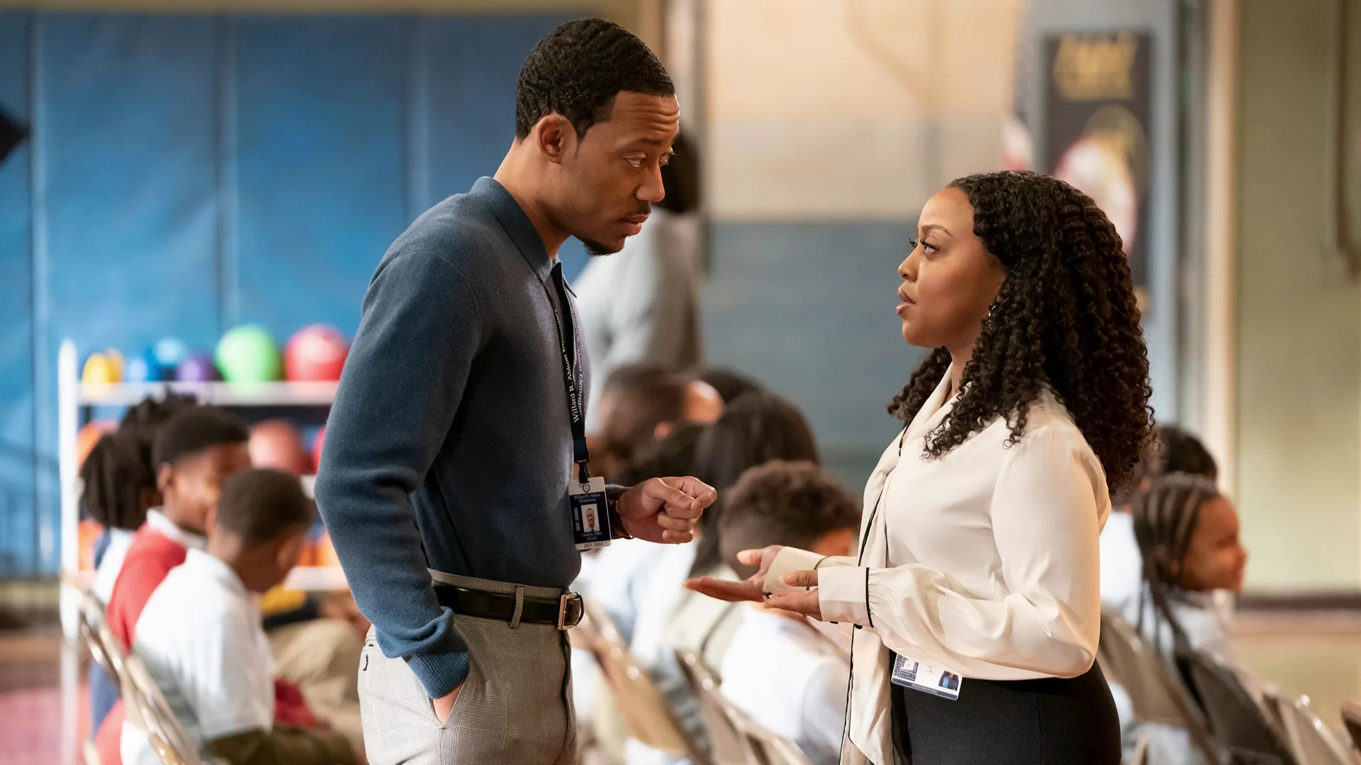 Gregory (Tyler James Williams) and Janine (Quinta Brunson) talk in a classroom.