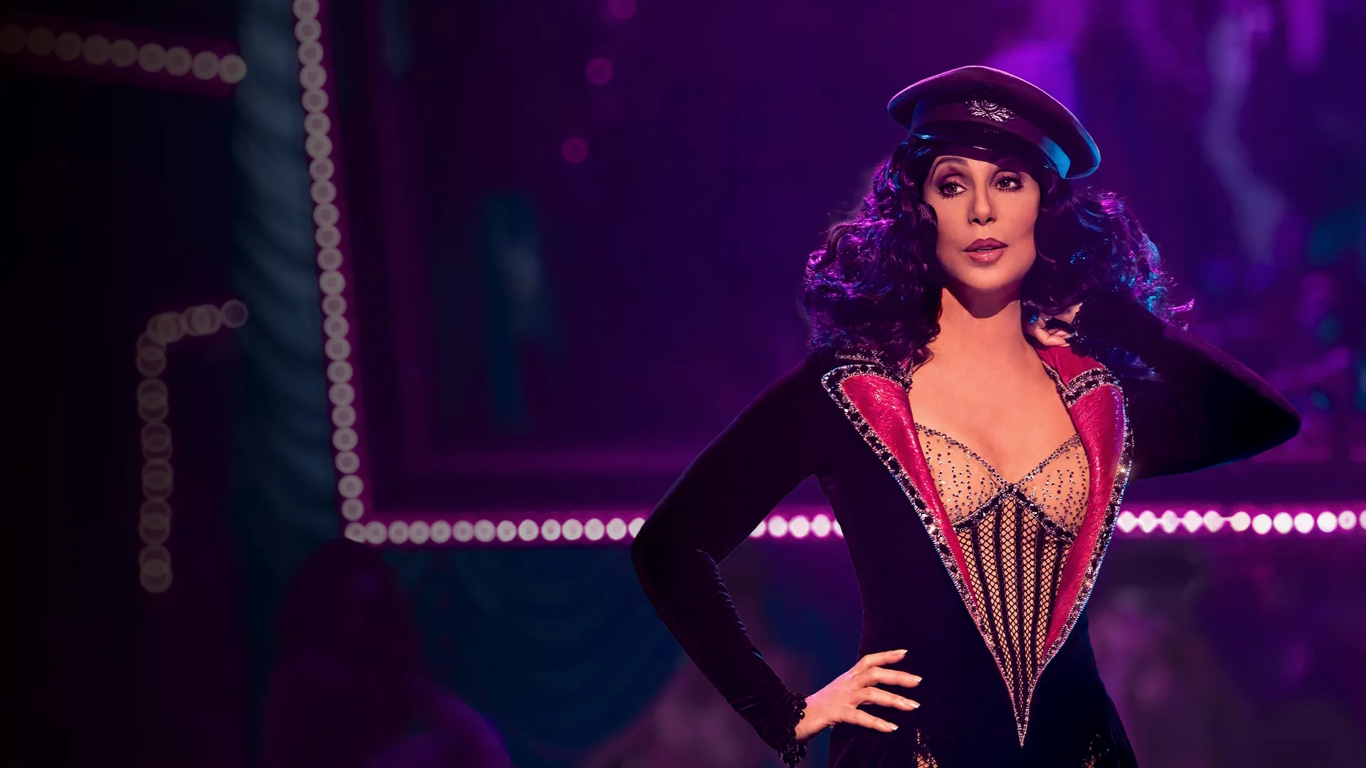 The image features the iconic singer and actress Cher portraying her character Tess in the 2010 musical drama film Burlesque.