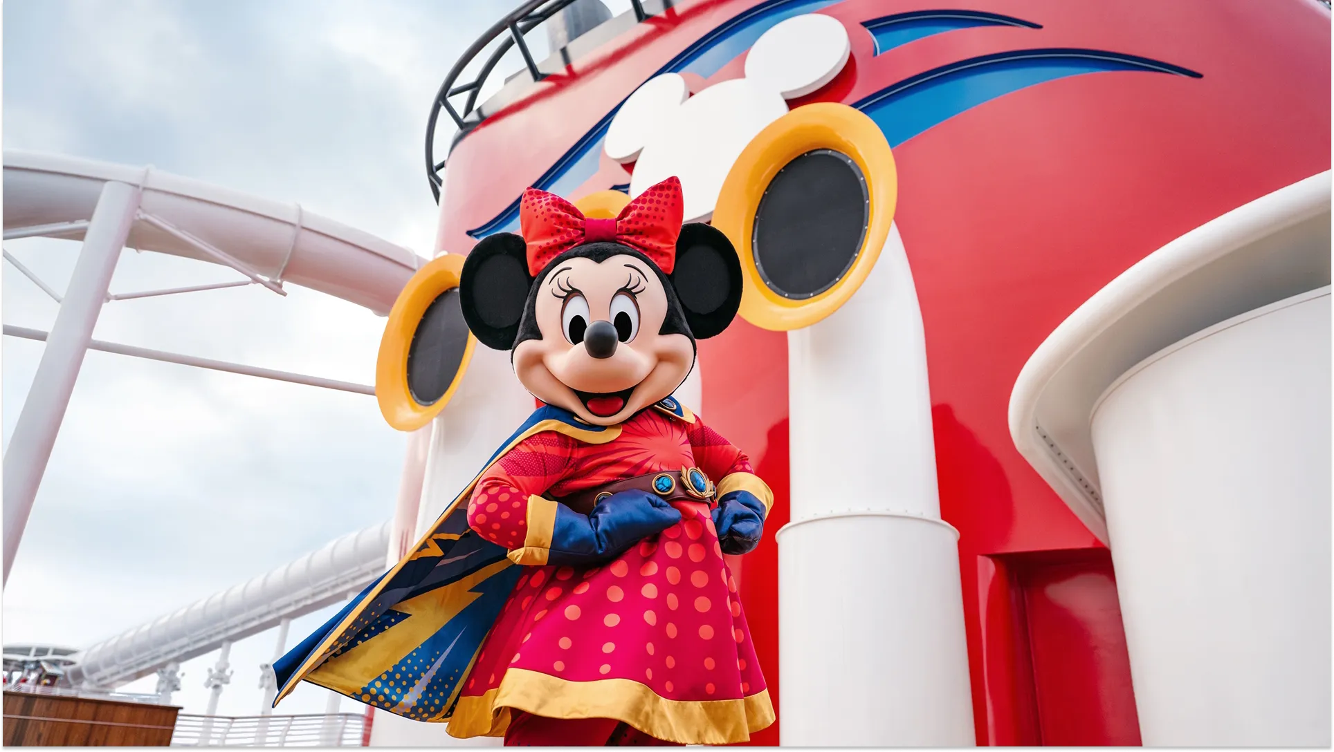 Minnie Mouse dressed in a superhero costume aboard the Disney Destiny cruise ship