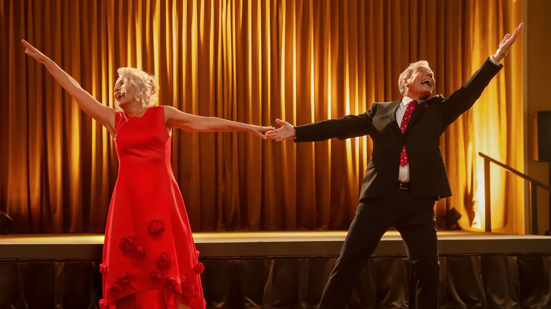 The scene features Bryan Cranston and Jane Kaczmarek reprising their iconic roles as Hal and Lois.