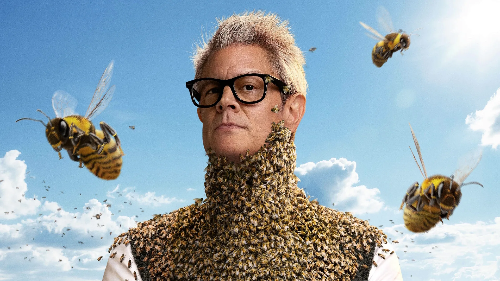 Host Johnny Knoxville completely covered in bees in a promotional image for Fear Factor: House of Fear. 