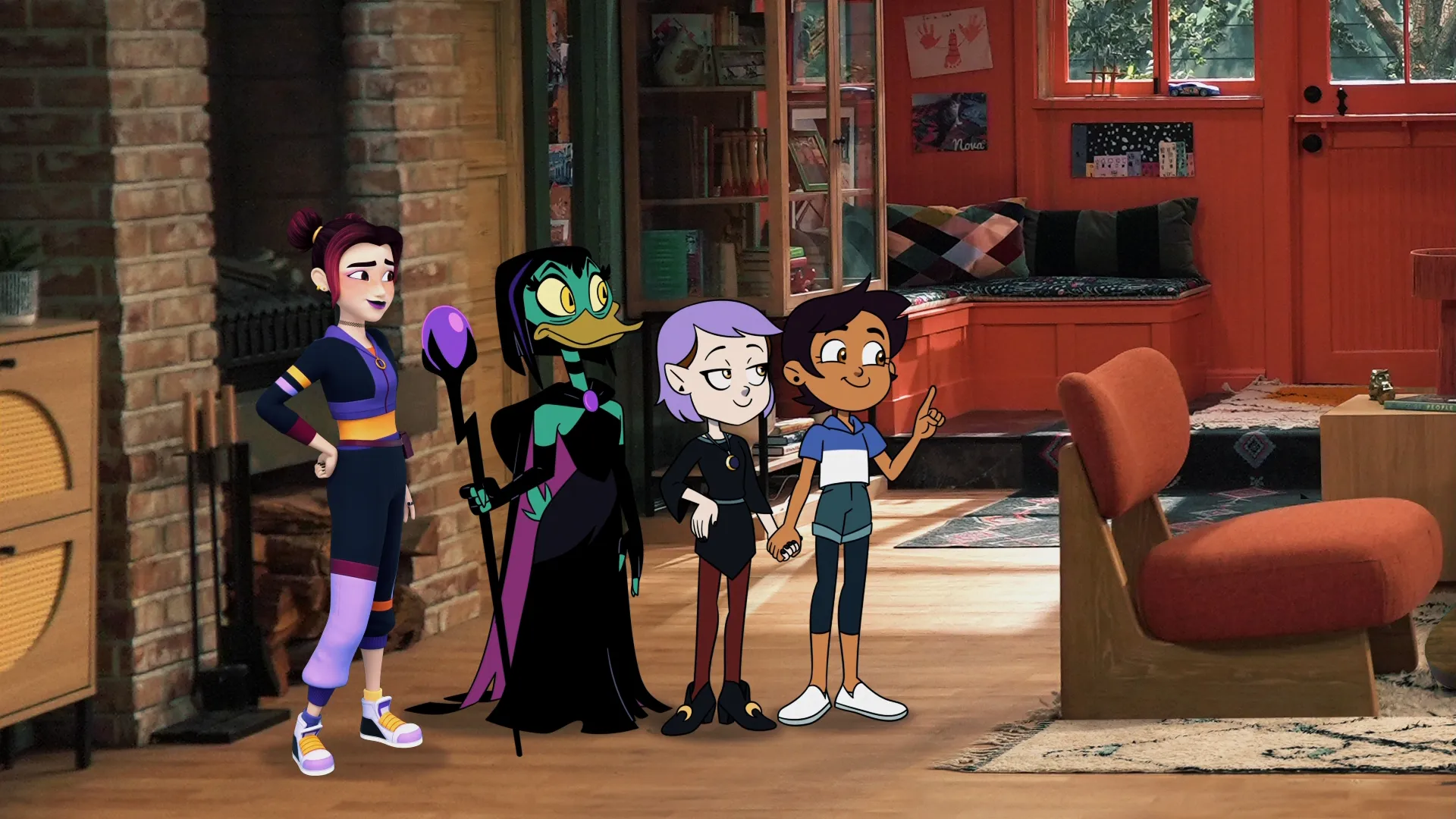 This image features animated characters Luz Noceda and Amity Blight from the series The Owl House interacting with other figures in a live-action setting.