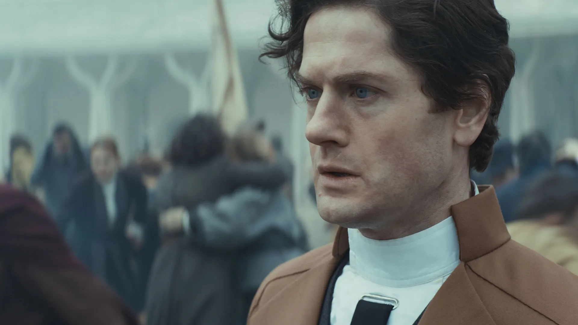 A shell-shocked Syril Karn (Kyle Soller) witnesses the Empire's massacre of the Ghorman people.
