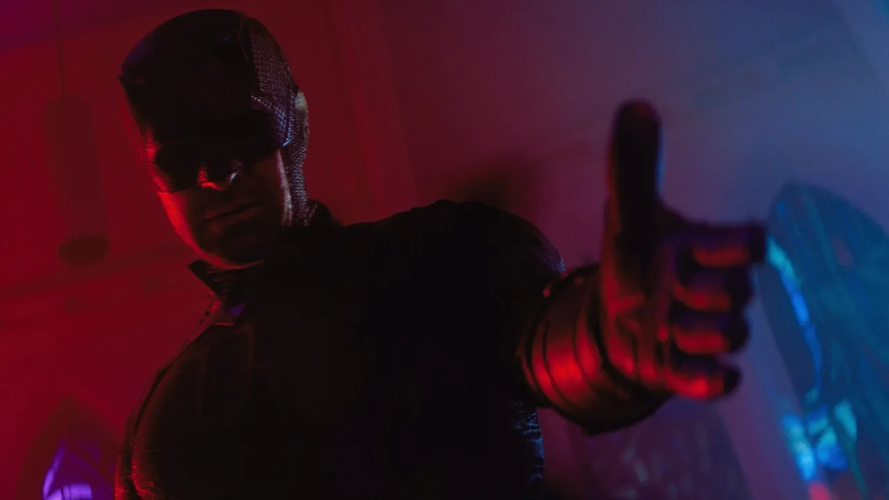 Key art for Daredevil: Born Again featuring Daredevil leaping forward as Wilson Fisk (The Kingpin) roars behind him. Season finale streaming May 5.