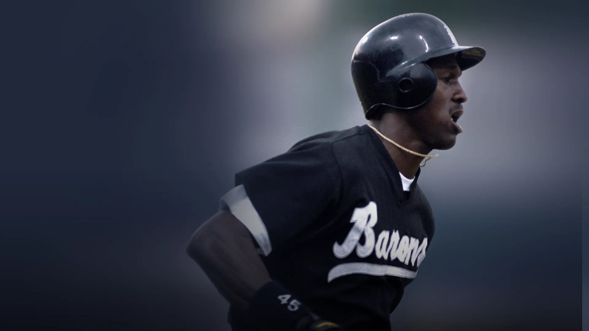 This image shows a scene from the ESPN 30 for 30 documentary Jordan Rides the Bus, featuring Michael Jordan during his time with the Birmingham Barons.