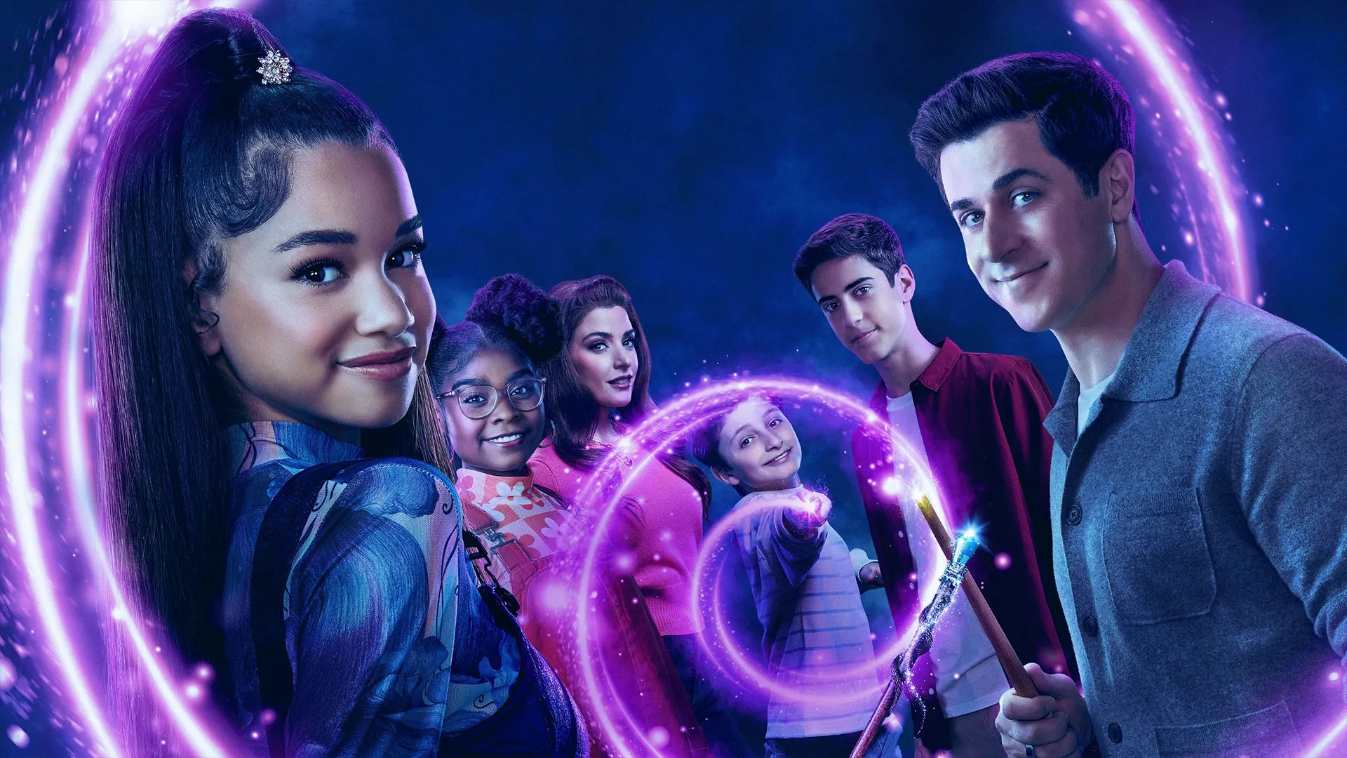 Key art for Wizards Beyond Waverly Place featuring a group of young wizards surrounded by glowing purple magical effects.