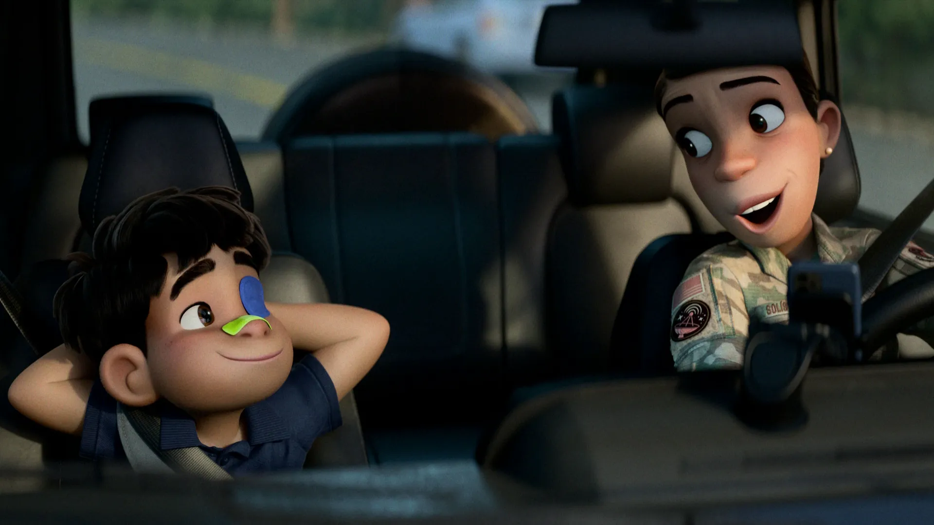 Elio (voiced by Yonas Kibreab) in the car with his Aunt Olga (voiced by Zoe Saldaña)
