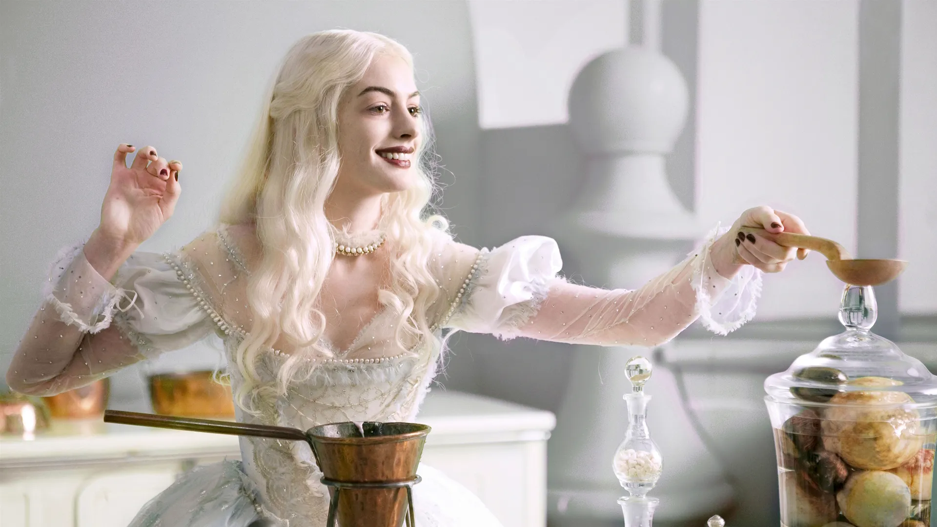 Anne Hathaway as the White Queen in Alice in Wonderland.